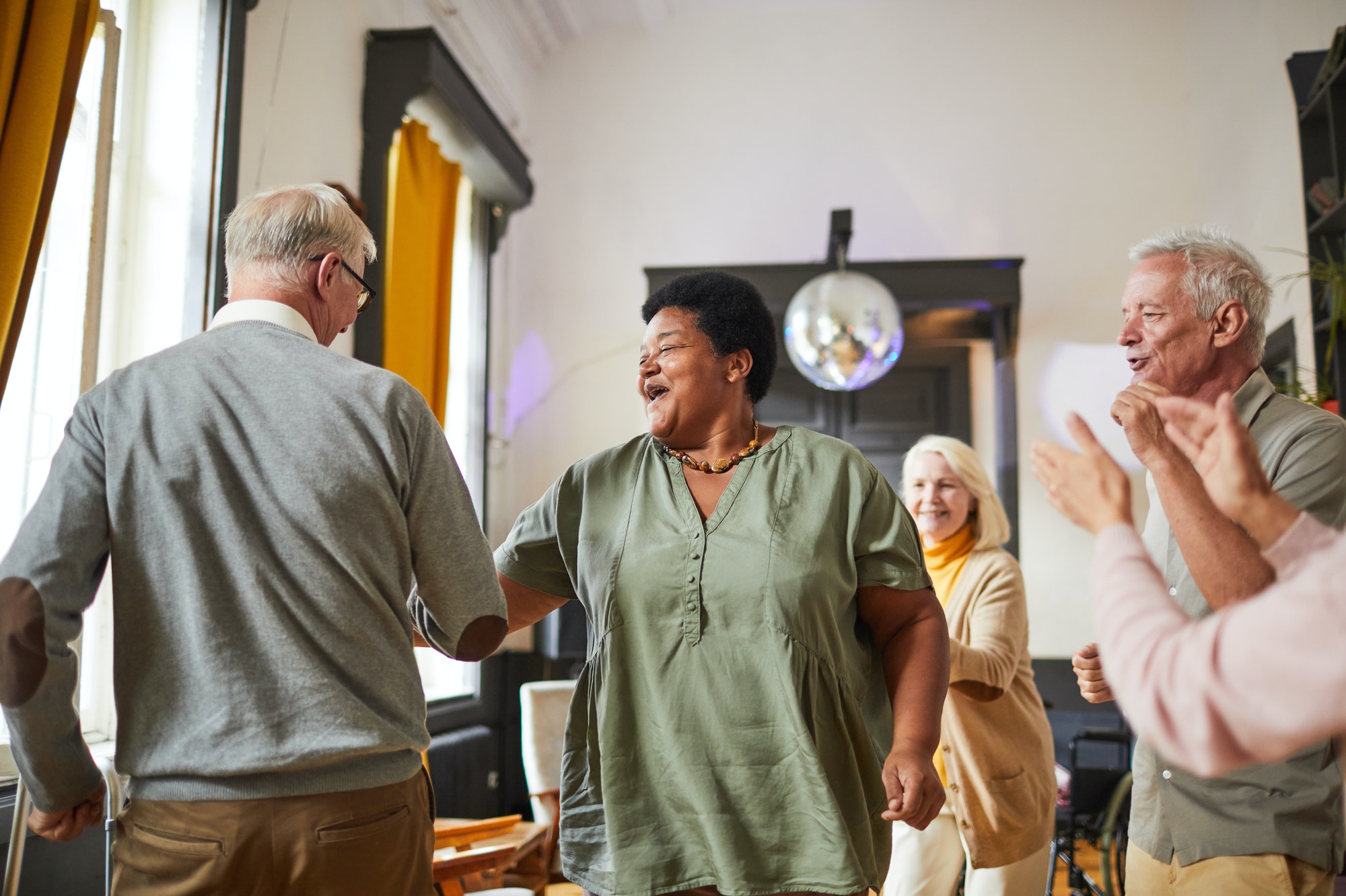 Senior People Dancing in Nursing Home